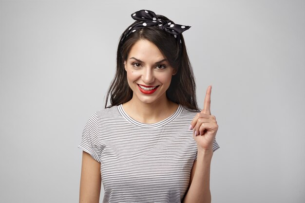 Portrait of an expressive woman posing in the studio