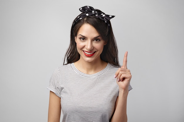 Portrait of an expressive woman posing in the studio