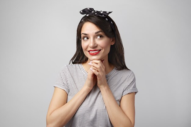 Portrait of an expressive woman posing in the studio