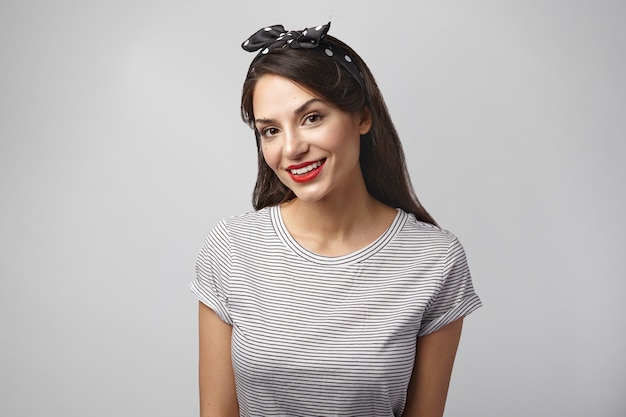 Portrait of an expressive woman posing in the studio