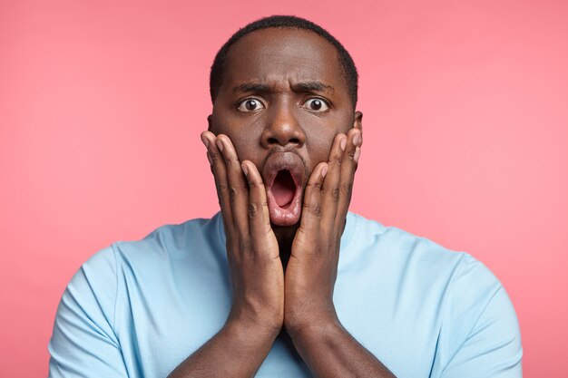 Portrait of expressive young man