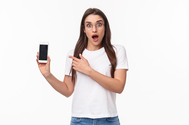 portrait expressive young woman with mobile