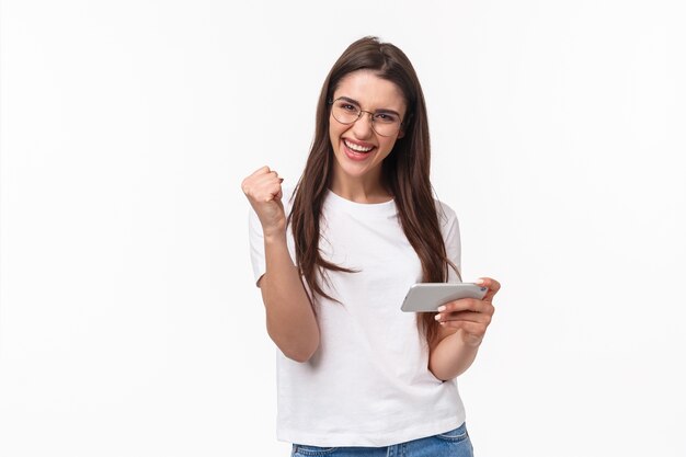 portrait expressive young woman with mobile