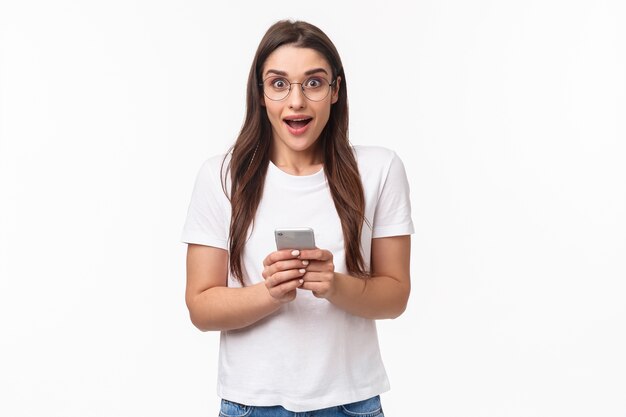 portrait expressive young woman with mobile