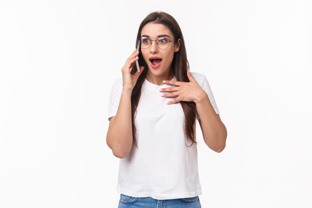 portrait expressive young woman with mobile