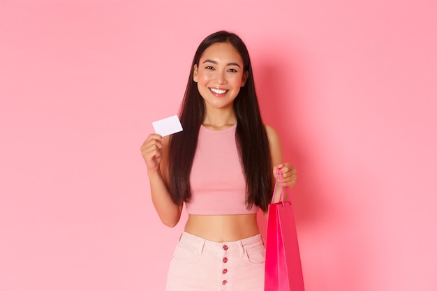 Portrait expressive young woman with shopping bags