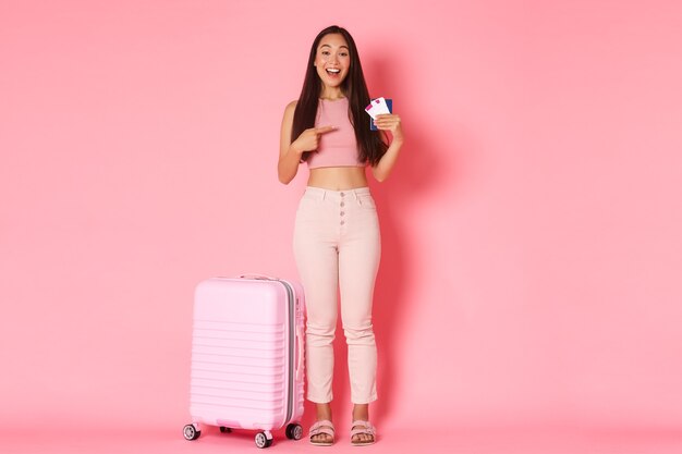 Portrait expressive young woman with suitcase