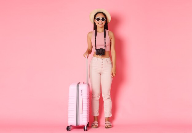 Portrait expressive young woman with suitcase