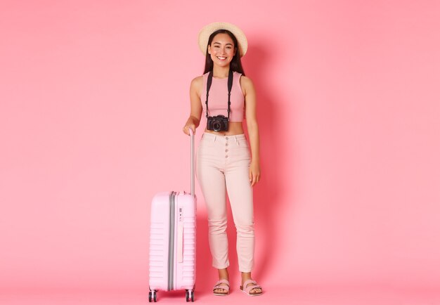 Portrait expressive young woman with suitcase