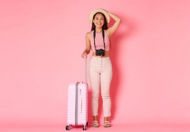 Portrait expressive young woman with suitcase