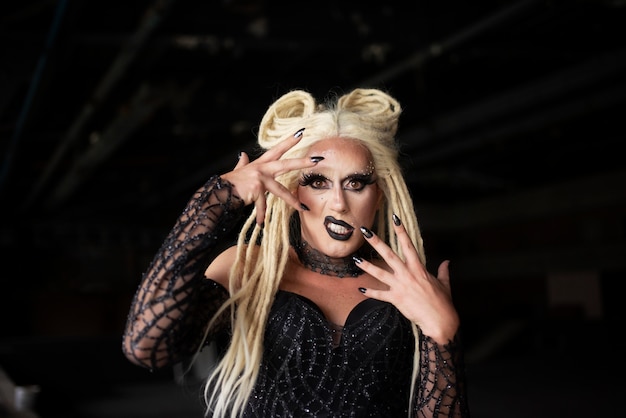 Free photo portrait of fabulous drag queen with a blonde wig