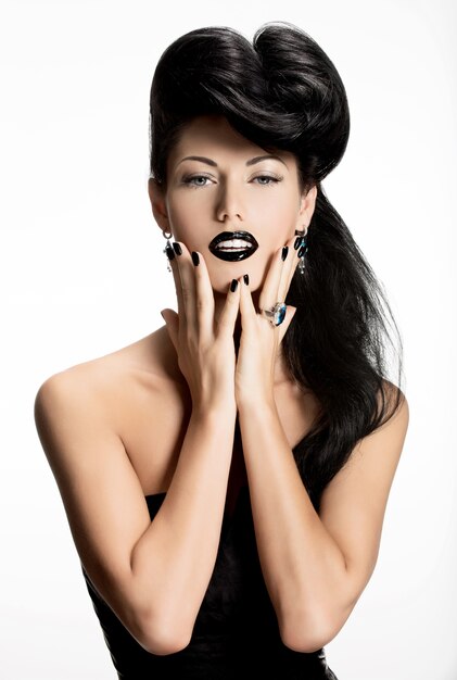 Portrait of fashion woman with black nails and lips in black color