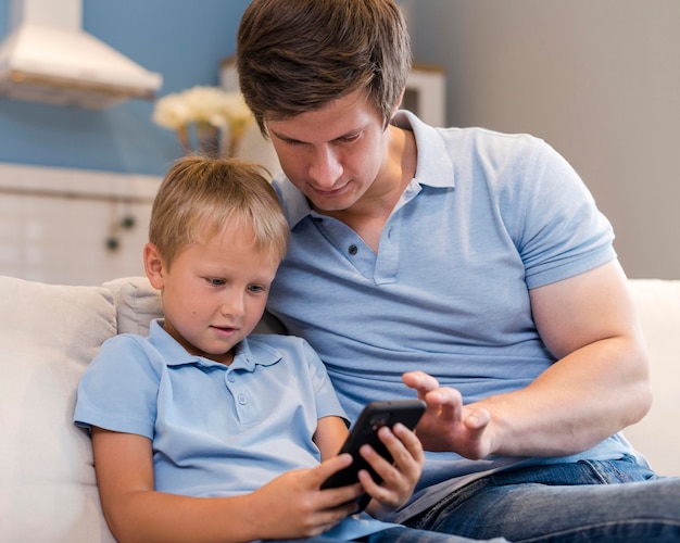 Free photo portrait of father spending time with son