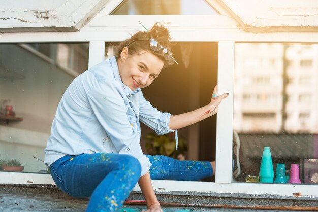 Portrait of female artist outdoors