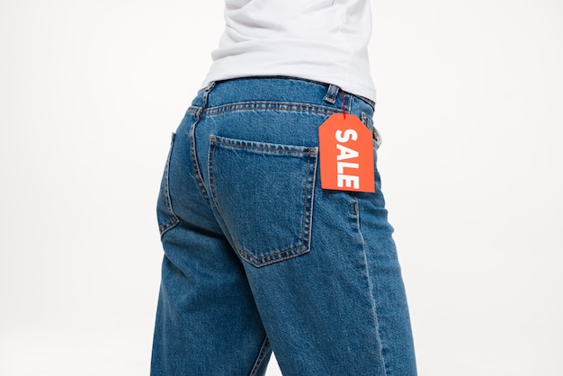 Portrait of a female buttocks in jeans