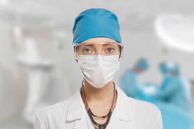 Portrait of female doctor wearing equipment