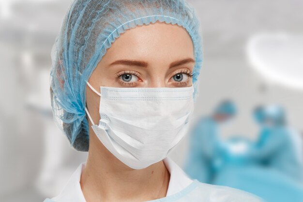 Portrait of female doctor wearing equipment