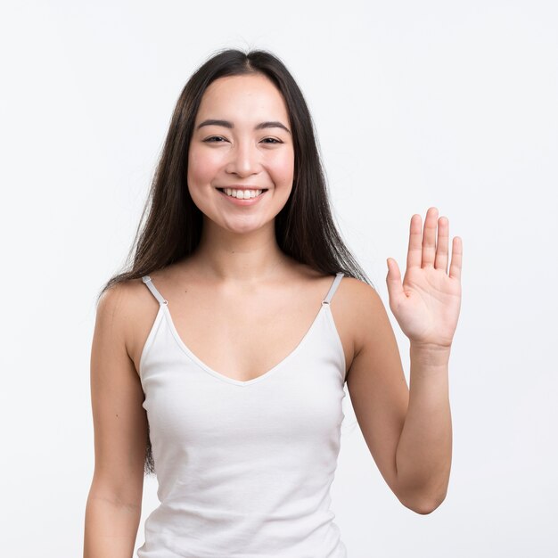 Portrait female waving