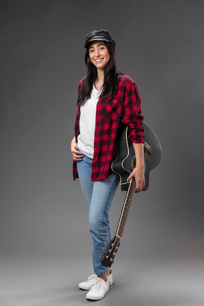 Portrait female with guitar