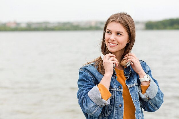 Portrait female with headphones outdoor