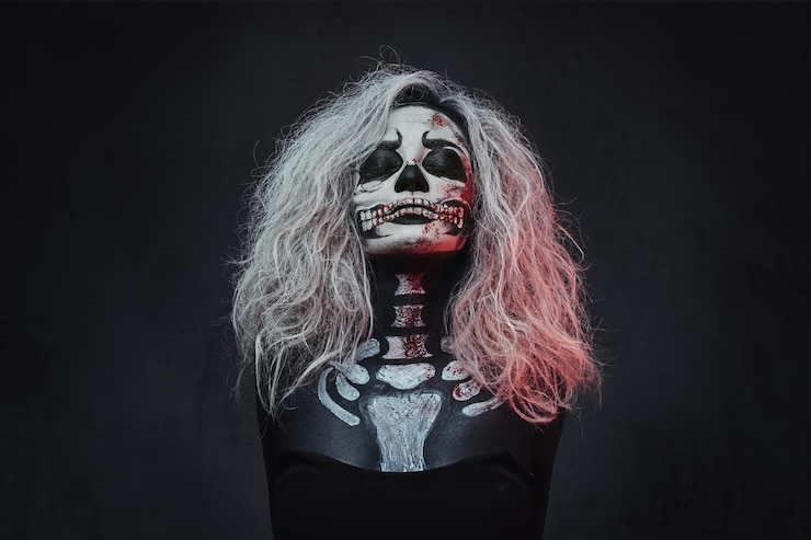 Free Photo portrait of female with skull make up