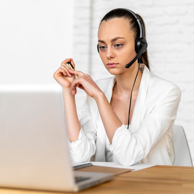 Portrait female at work having video call