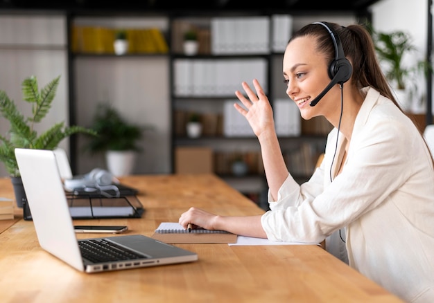 Portrait female at work having video call