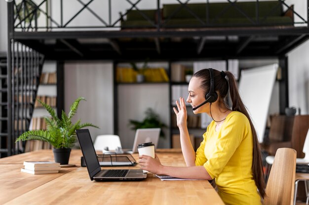 Portrait female at work having video call