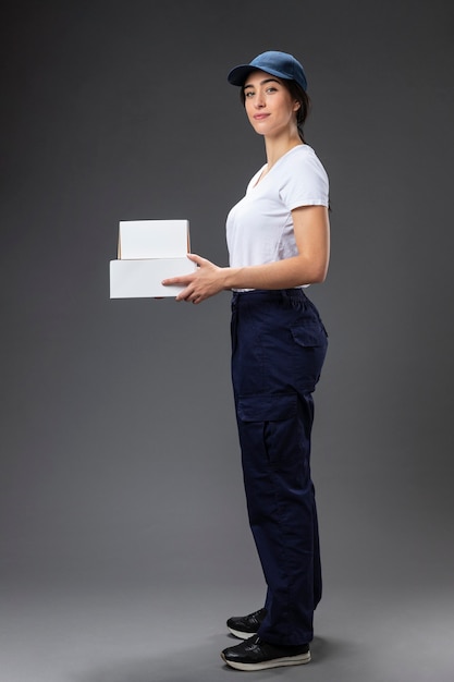 Free photo portrait female working for delivery service