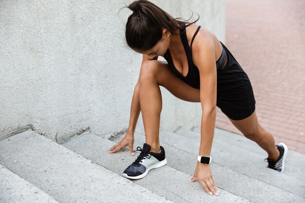 Portrait of a fitness woman doing sports exercises