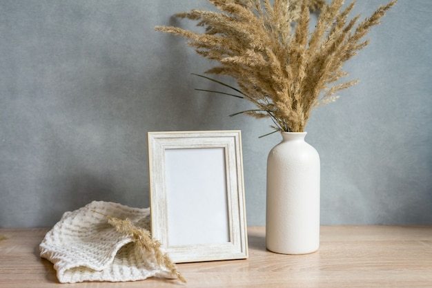 Portrait frame mock up with dried flowers. high quality photo