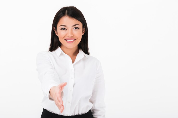 Free Photo portrait of a friendly asian businesswoman greeting you