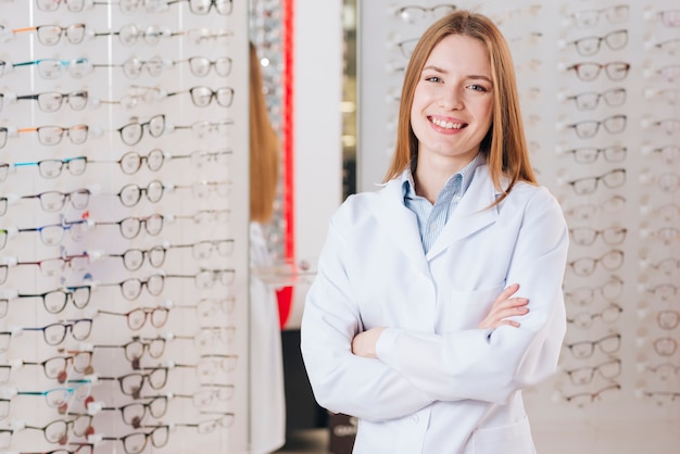 Portrait of friendly female optometrist