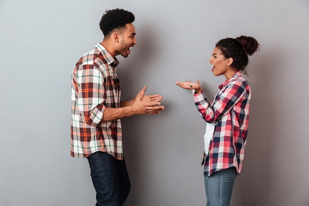 Portrait of a furious young african couple having a quarrel