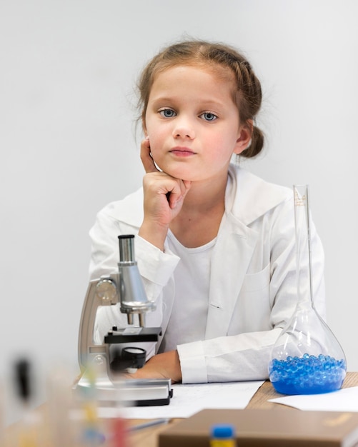 Free photo portrait girl learning science