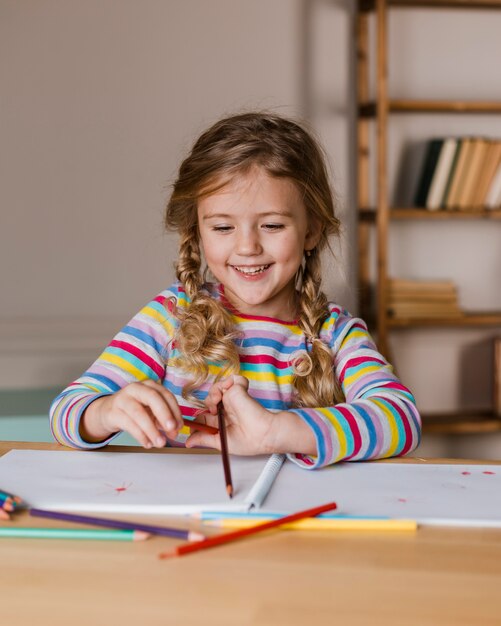 Portrait girl painting with colouring pencils 