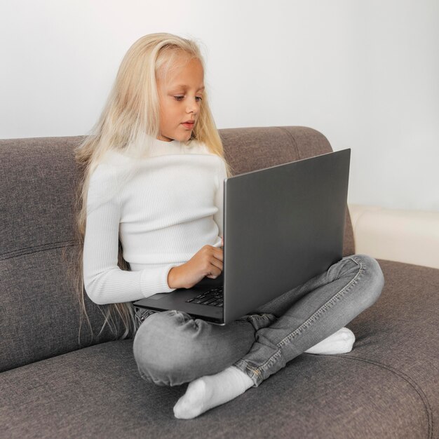 Portrait of a girl paying attention to online class