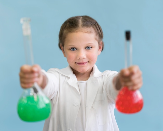 Portrait girl with science tubes