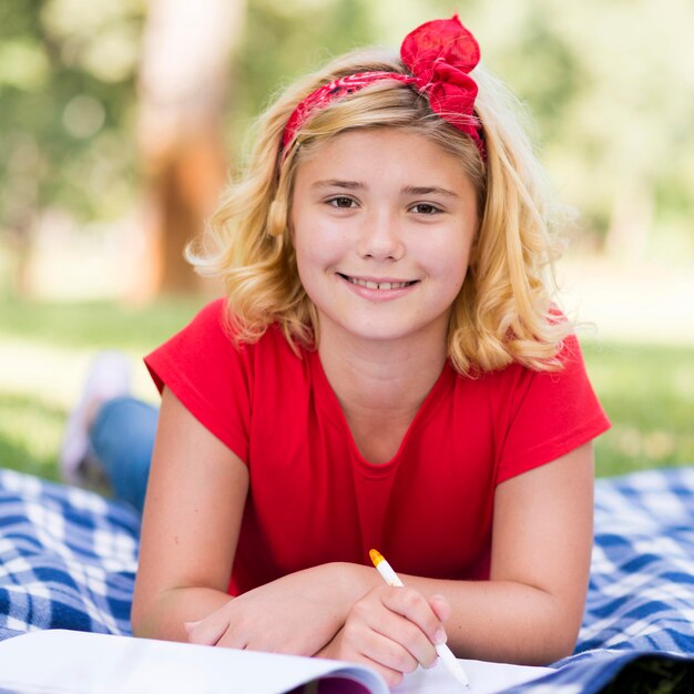 Portrait girl writing