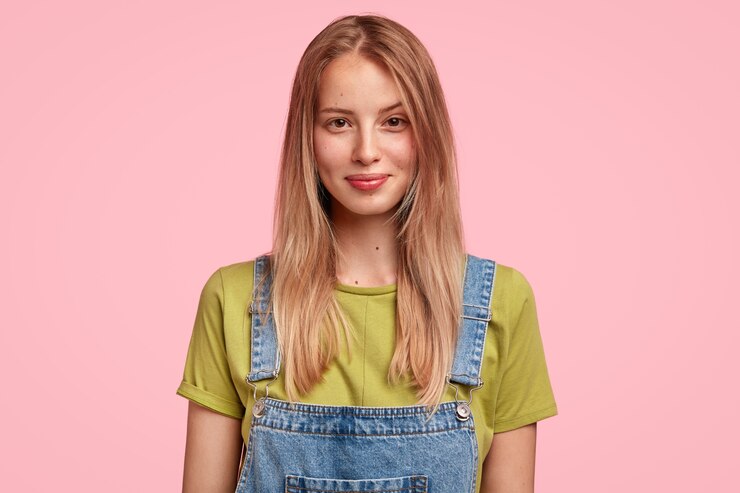 Free Photo portrait of glad european female enjoys happy teenage years