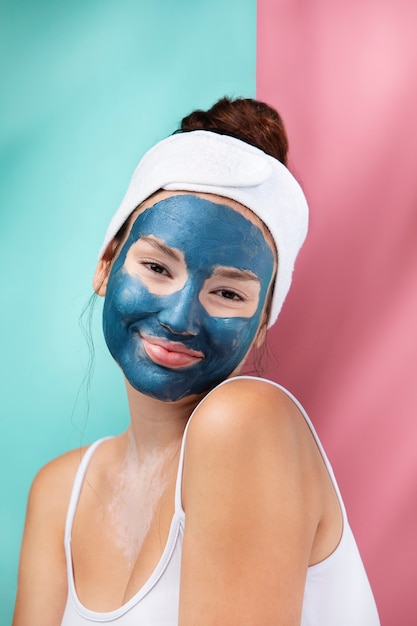 Portrait of a gorgeous woman using face mask