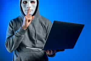 Free photo portrait of hacker with mask