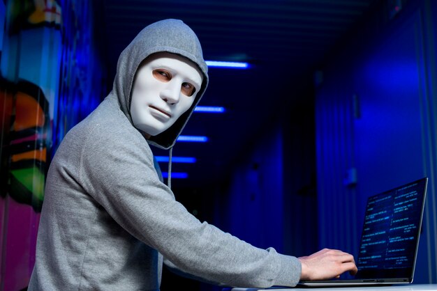 Portrait of hacker with mask