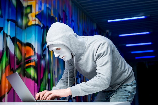 Portrait of hacker with mask