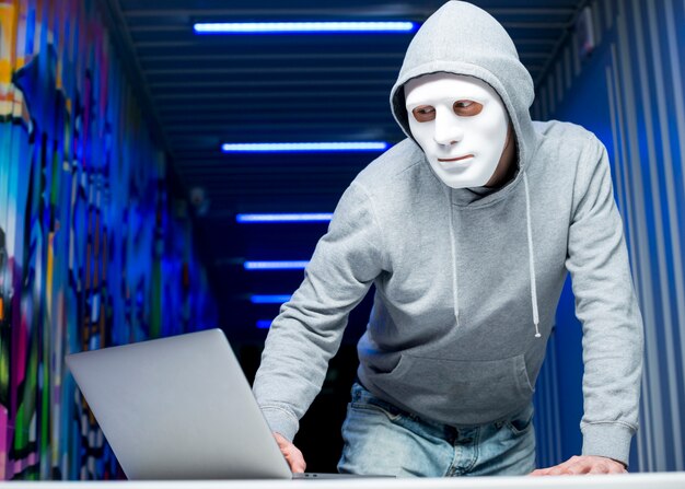 Portrait of hacker with mask