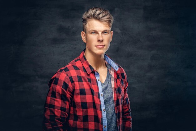 Portrait of handsome blond male dressed in a red fleece shirt.