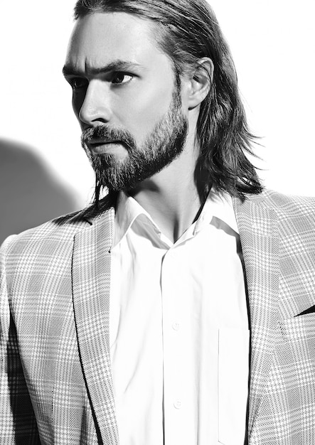 portrait of handsome fashion stylish hipster businessman model dressed in elegant light blue suit