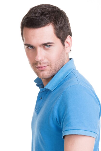 Portrait of  handsome man in in blue shirt .