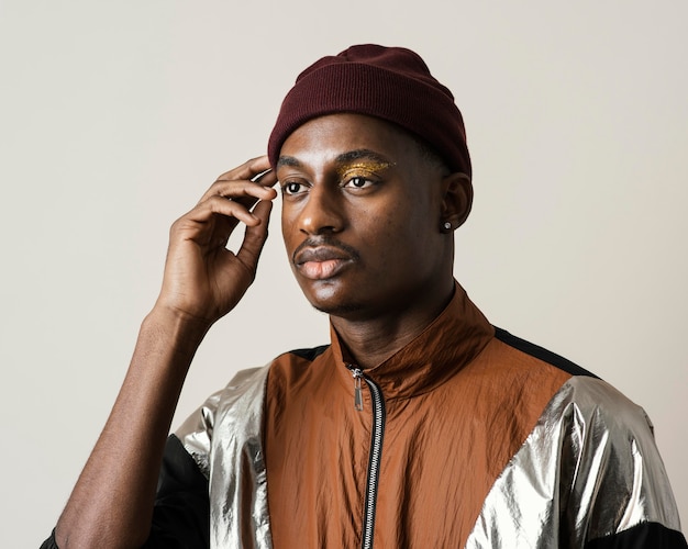 Portrait of handsome man wearing make-up