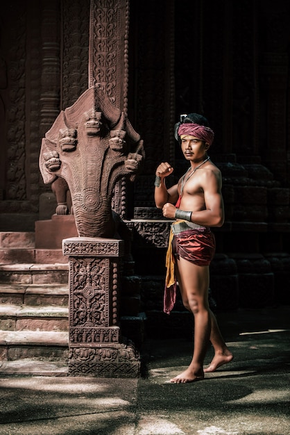 Portrait Handsome shirtless man in turban on head and beautiful silver ornament